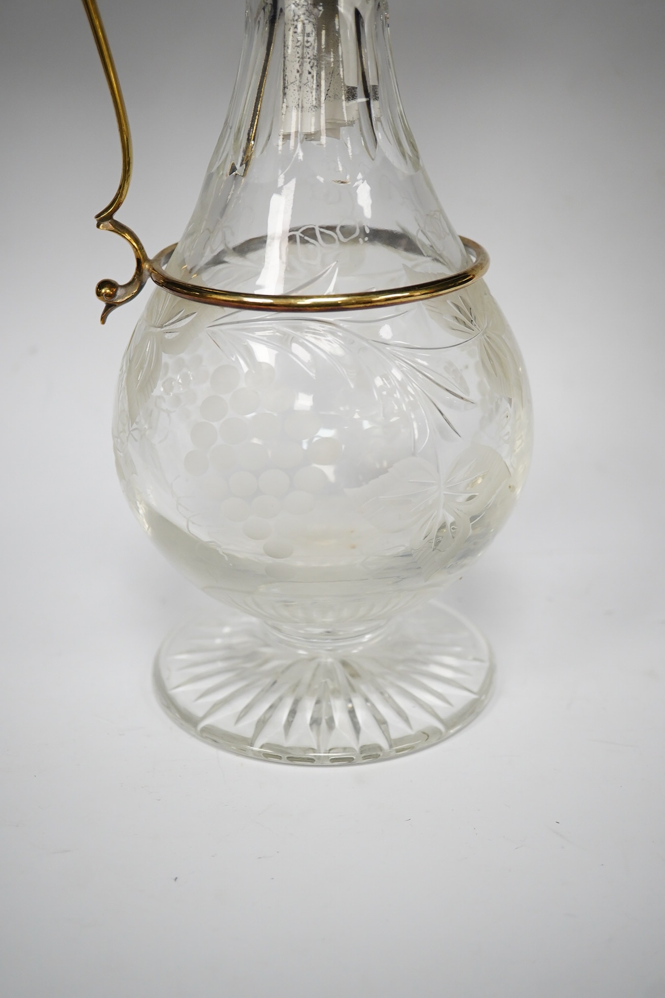 A modern silver gilt mounted cut glass pyriform claret jug, maker JM, Sheffield, 2001, 31.2cm. Condition - good